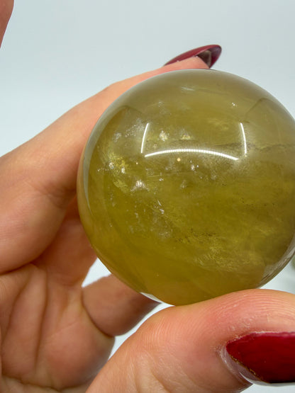 Orange Candy Fluorite Sphere with Mica